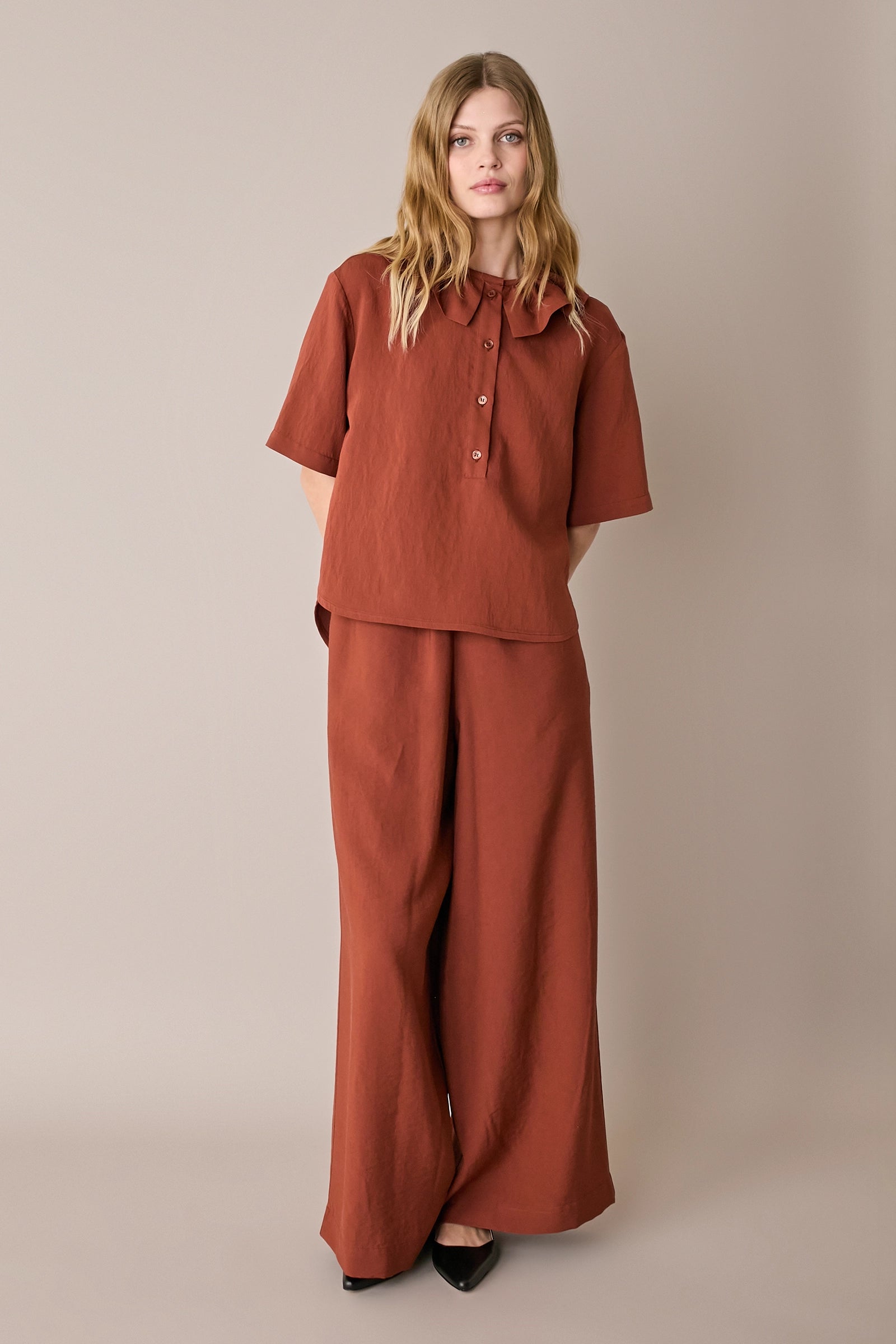 Ruffled polo top