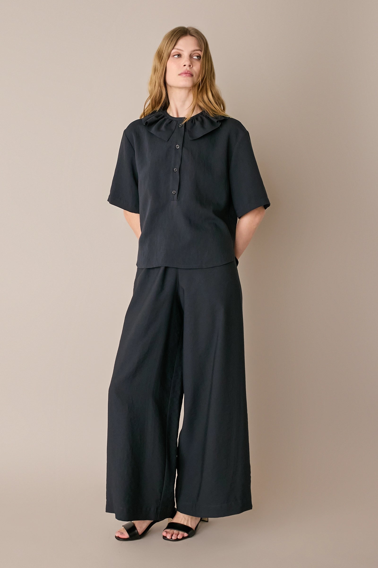 Ruffled polo top