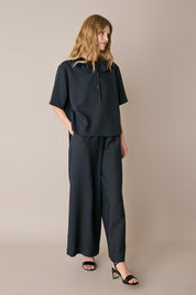 Ruffled polo top