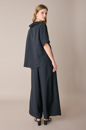 Ruffled polo top