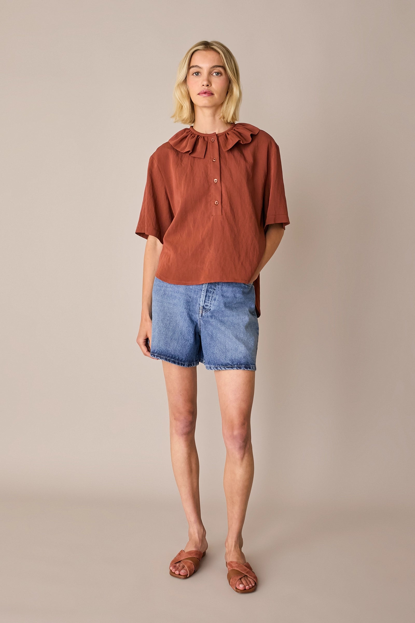 Ruffled polo top