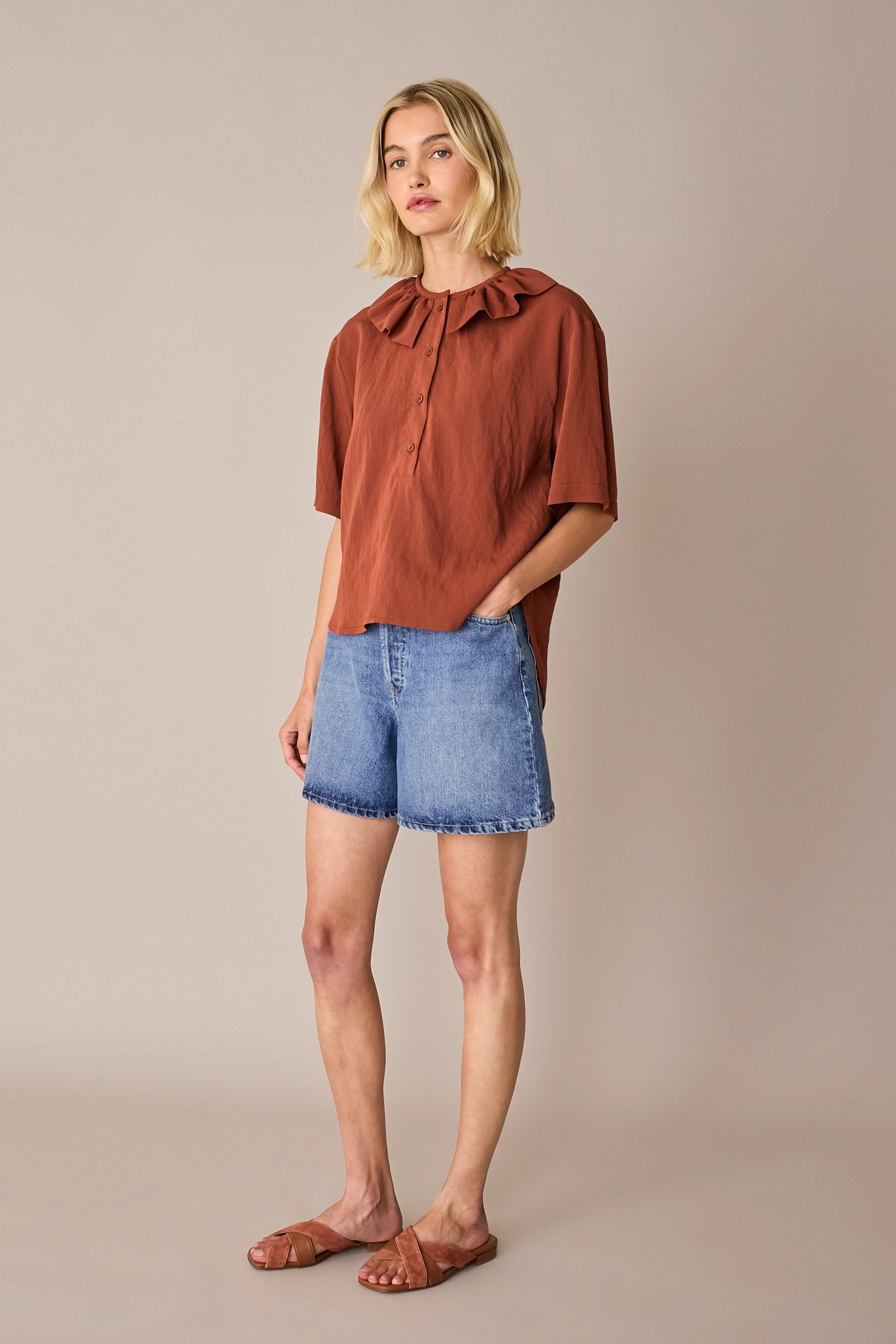 Ruffled polo top