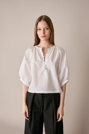 Top in cotone con bottoncini rivestiti