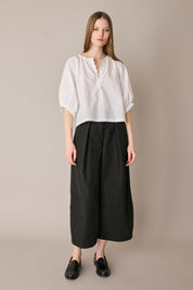 Top in cotone con bottoncini rivestiti