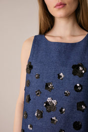 Denim top with sequin flowers