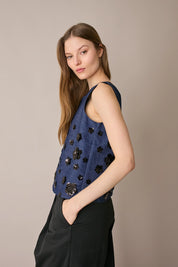 Denim top with sequin flowers
