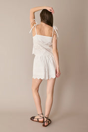 Top in pizzo Sangallo con spalline regolabili