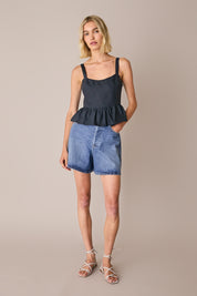 Top in lino con balza