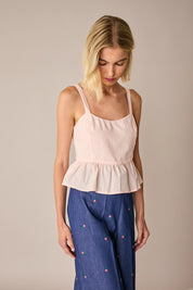 Top in cotone con balza