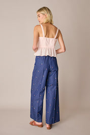 Top in cotone con balza