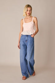 Top in cotone con balza