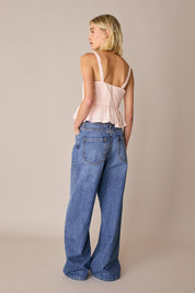 Top in cotone con balza