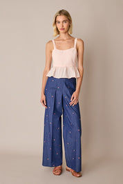 Top in cotone con balza