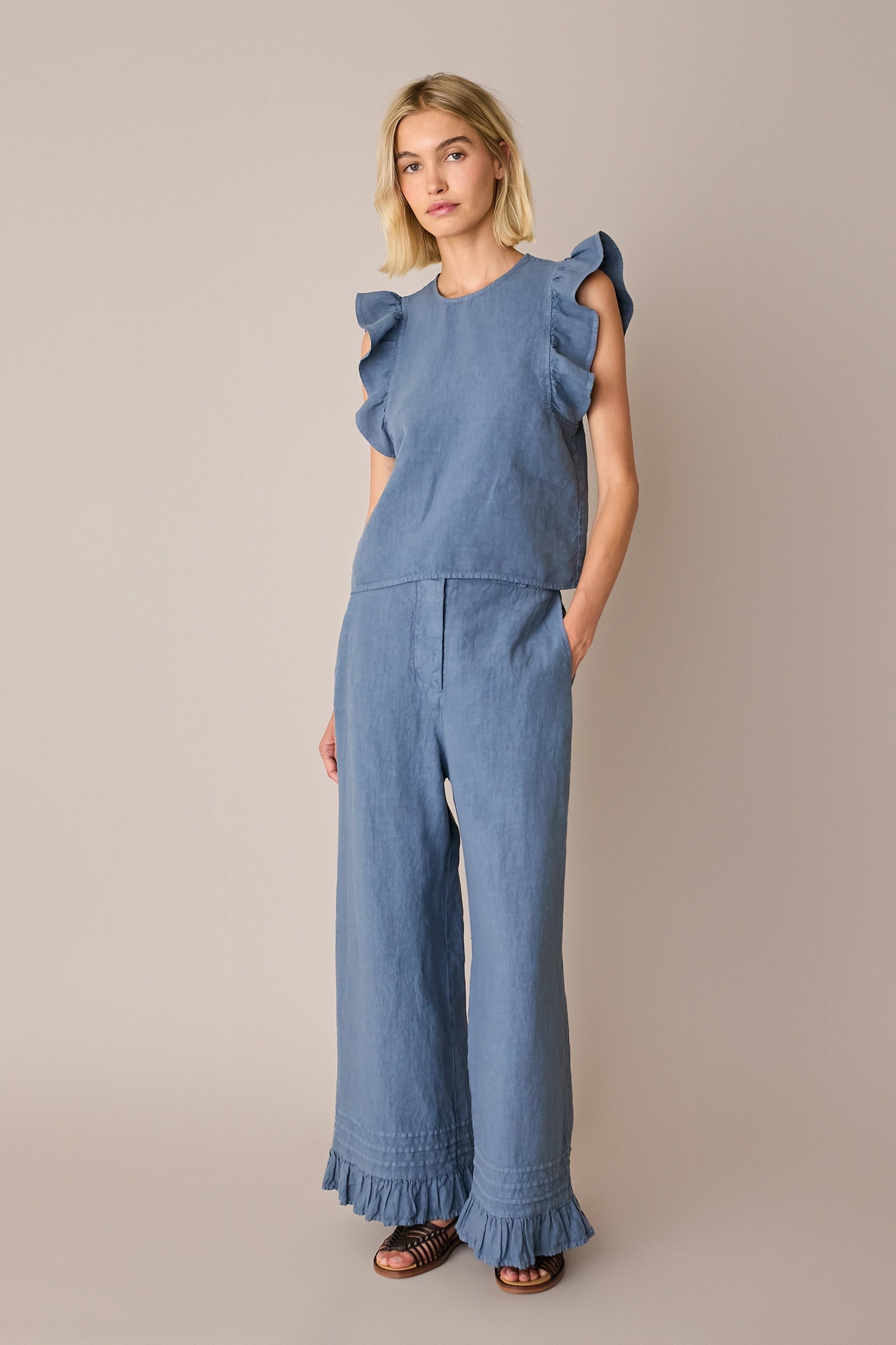 Linen trousers with frill hem
