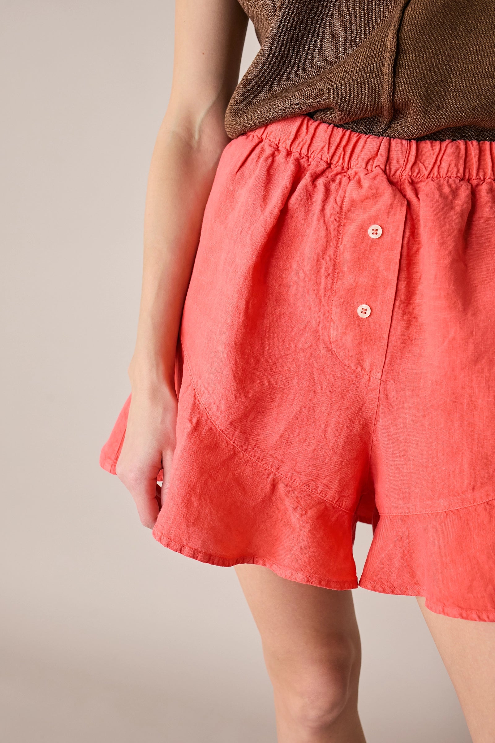 Shorts in lino con bottoni