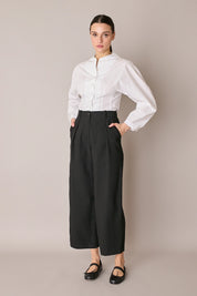 Pantaloni fluidi con pinces