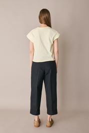 Pantaloni in cotone con piega e risvolto