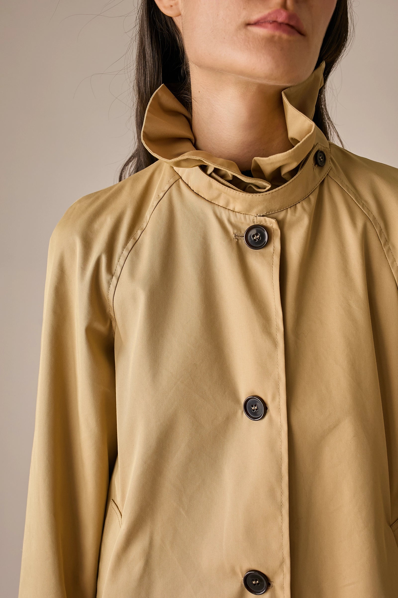 Ruffled collar trench coat