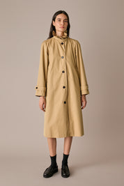 Ruffled collar trench coat