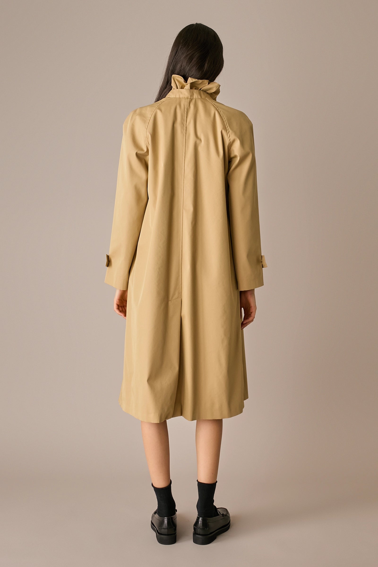 Ruffled collar trench coat