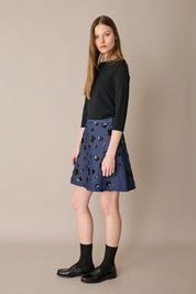 Denim skirt with sequin flowers