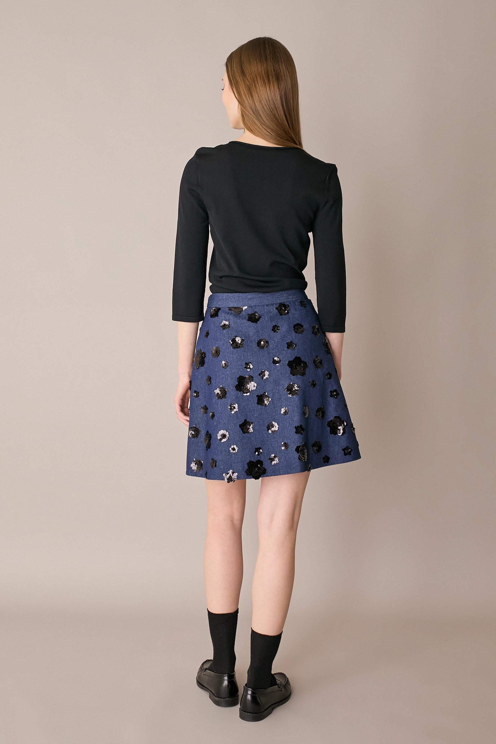 Denim skirt with sequin flowers