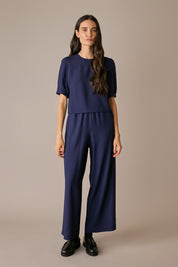 pantaloni in crêpe con vita elastica, gamba ampia e fluida, blu navy