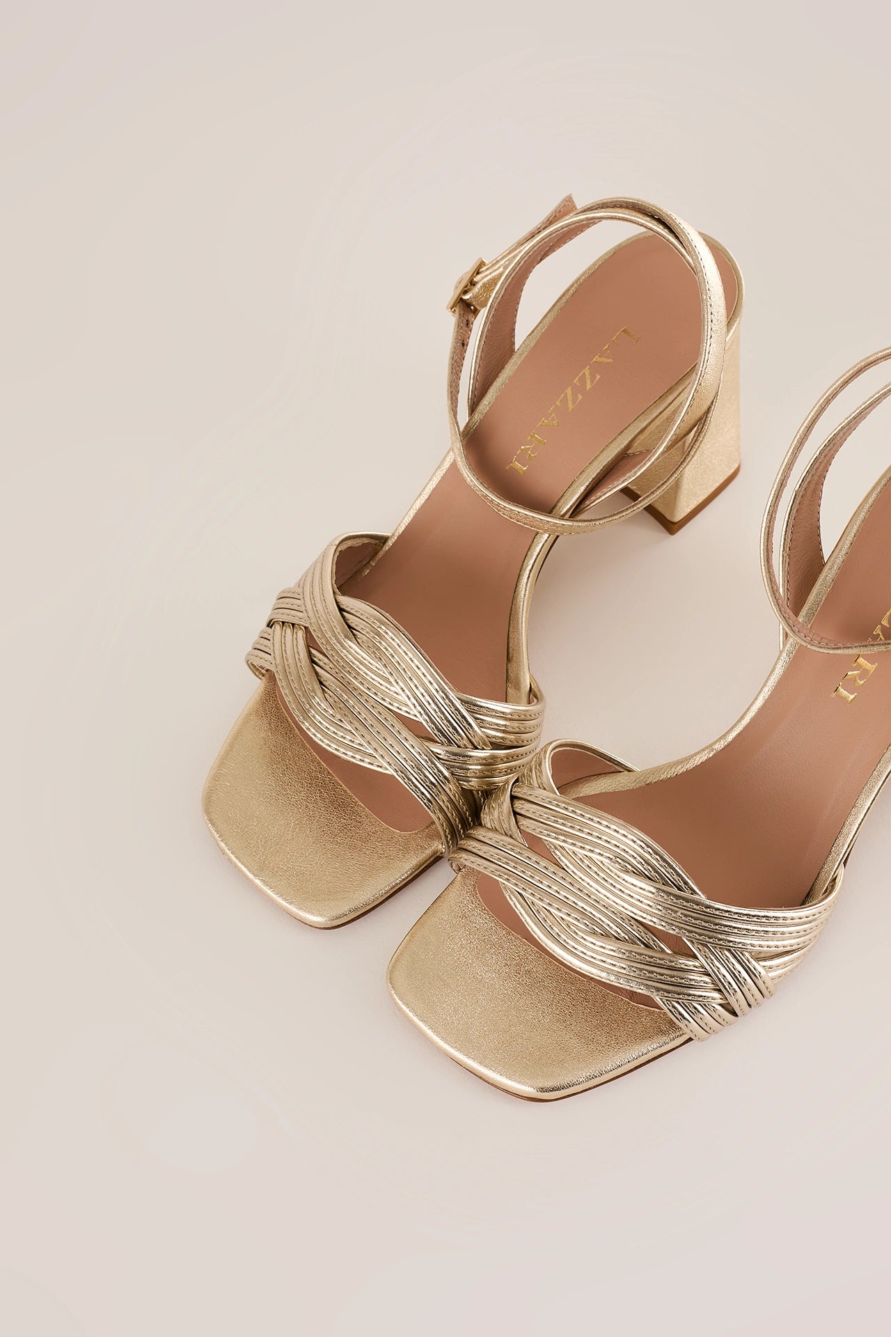 Metallic woven sandals with 7 cm block heel