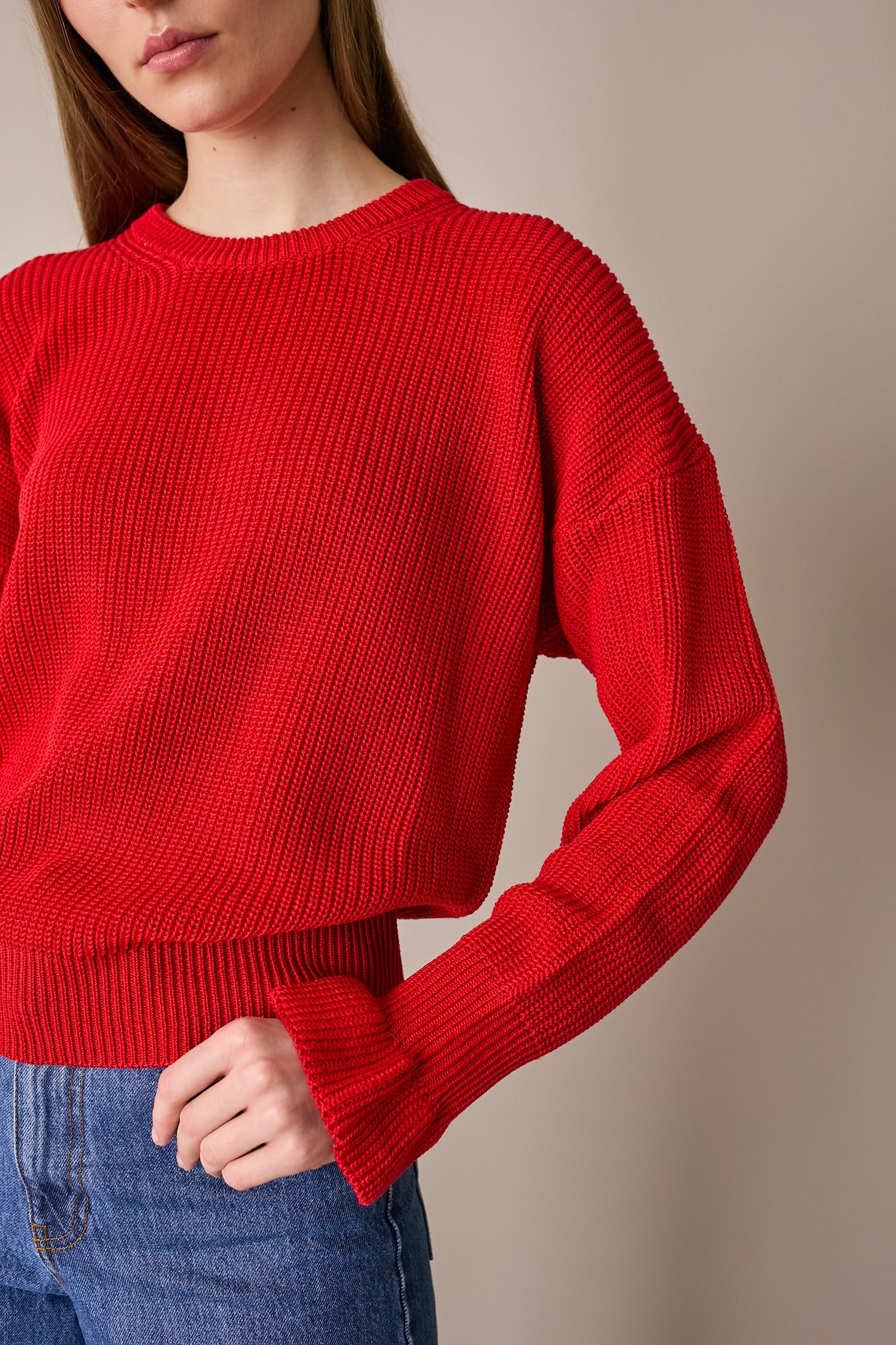 Maglia punto pannocchia con polsini volant
