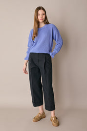 Maglia punto pannocchia con polsini volant