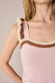 Top in maglia con volant