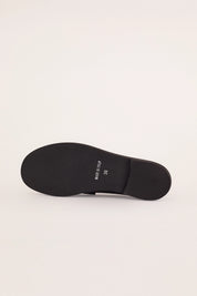 mocassini lucidi con punta stondata abrasivato nero per look casual